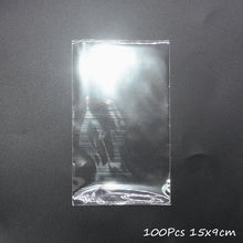 Load image into Gallery viewer, 100Pcs Transparent Plastic Bags for Candy Lollipop Cookie Packaging Cellophane Bag Christmas Wedding Birthday Party Gift Bag